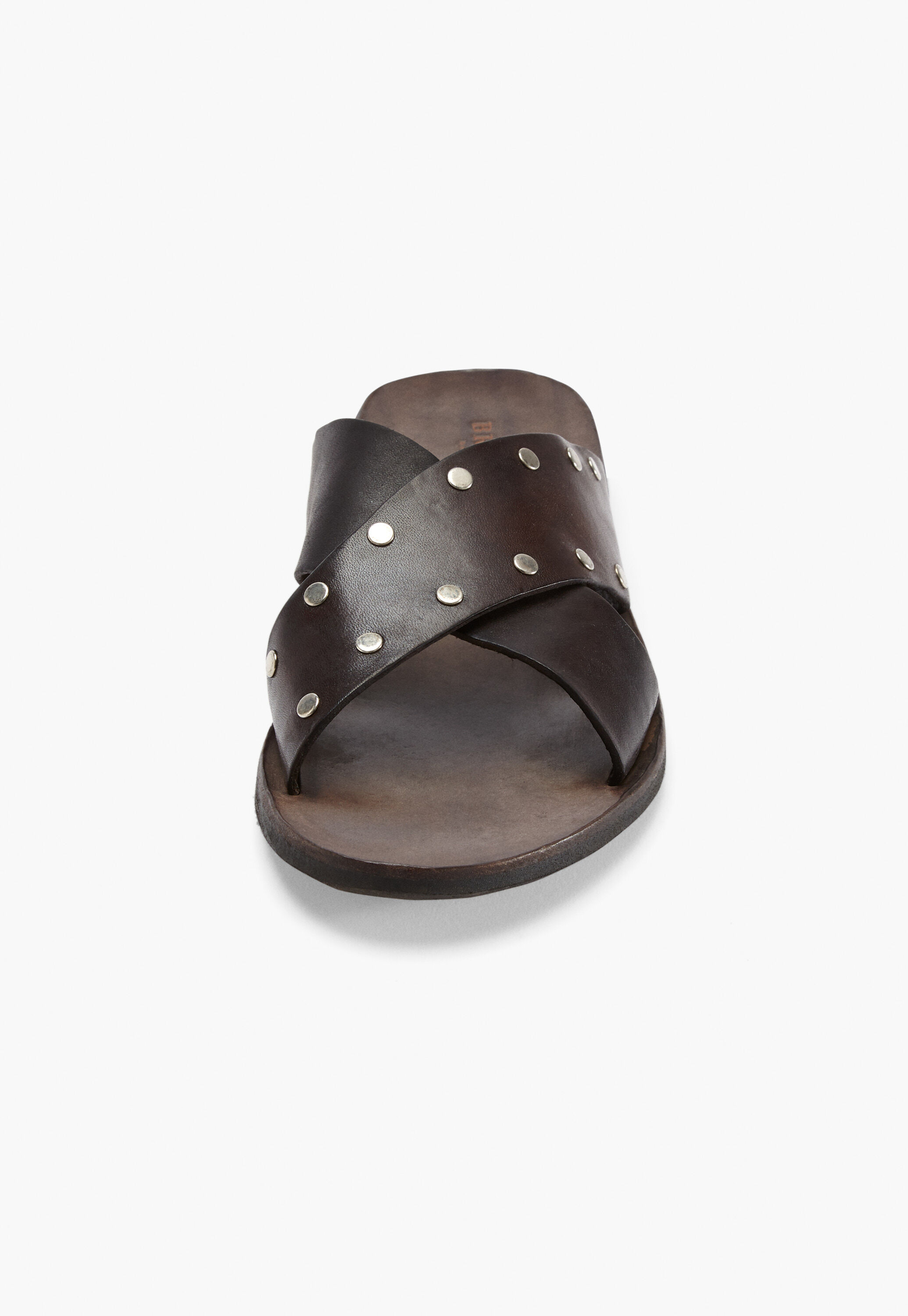 Cross-over studded sandals