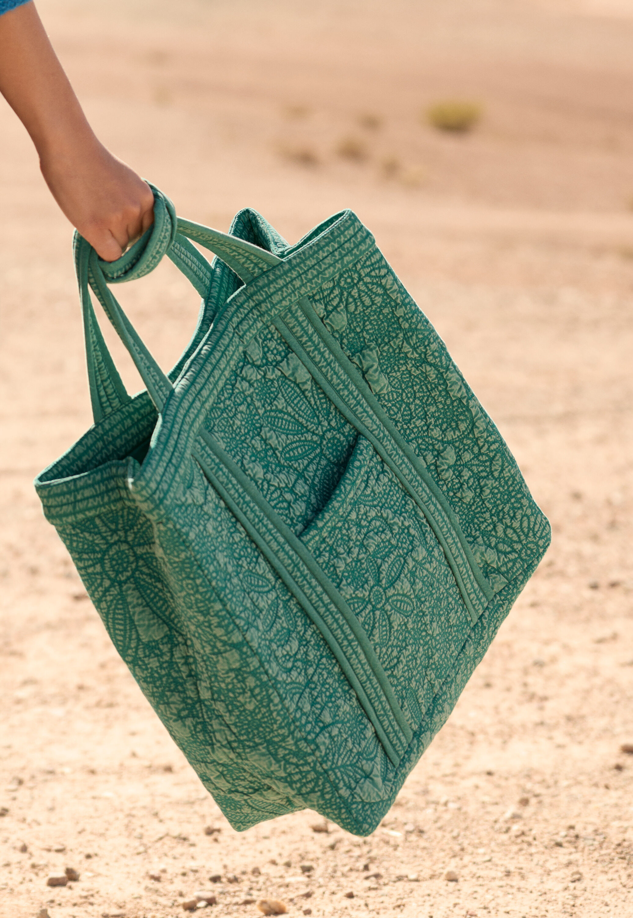 Embroidered quilted bag